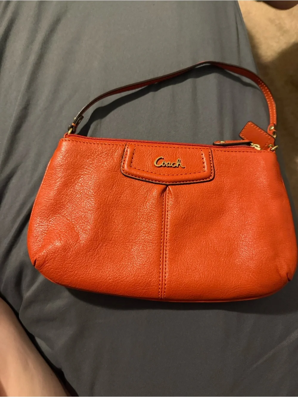 Coach Mini Wristlet in Burnt Orange Leather with Gold Hardware
